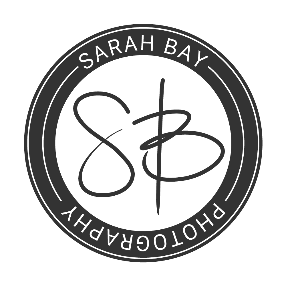 Sarah Bay Photography circular logo Columbus MS photographer