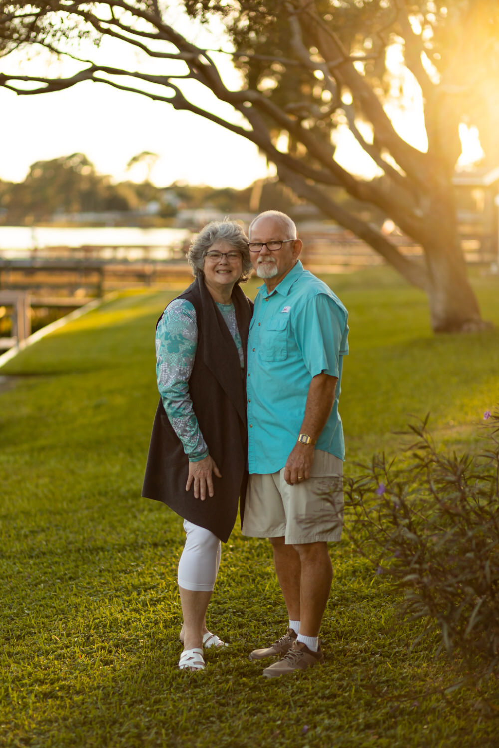 Portrait of couple by a lake Columbus MS lifestyle photographer